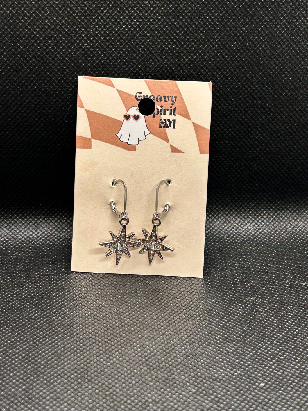 Silver starburst latch earrings
